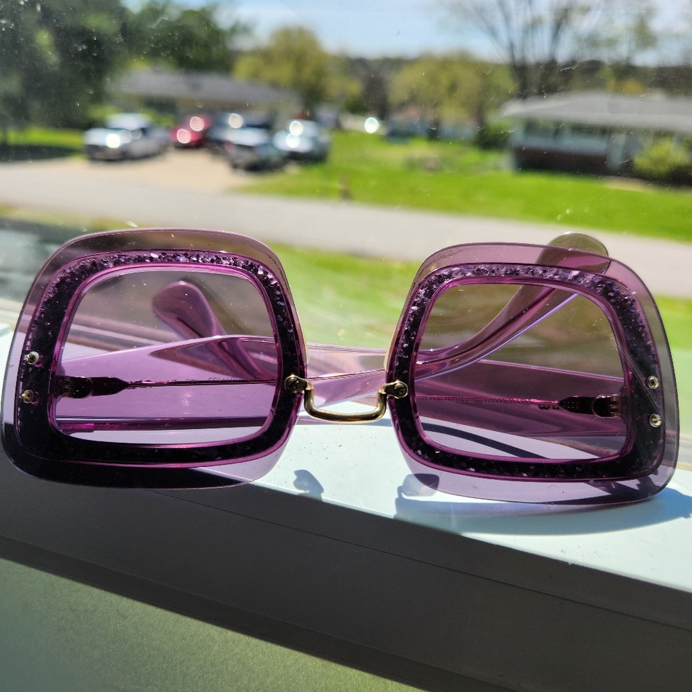 Purple Miu Miu sunglasses
